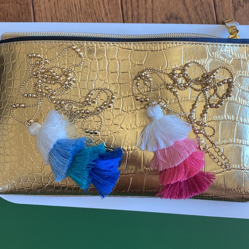 Two necklaces and Gold Clutch Bag